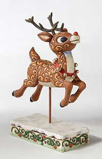 A stylized resin sculpture of Rankin-Bass Rudolph the Red-nosed Reindeer