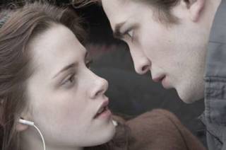 Robert Pattinson and Kristen Stewart as Edward the vampire and Bella Swan in TWILIGHT