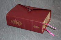 A set of the four Mormon/LDS scriptures (King James version of the Bible, Book of Mormon, Doctrine & Covenants, and Pearl of Great Price) in one book.