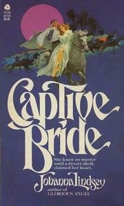 The cover of the novel CAPTIVE BRIDE by Johanna Lindsey.