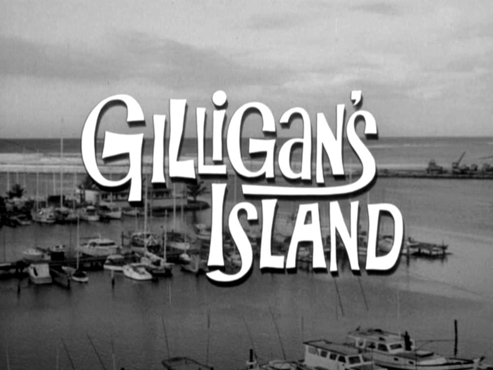 TV title sequence: GILLIGAN'S ISLAND overlying a harbor with boats moored.